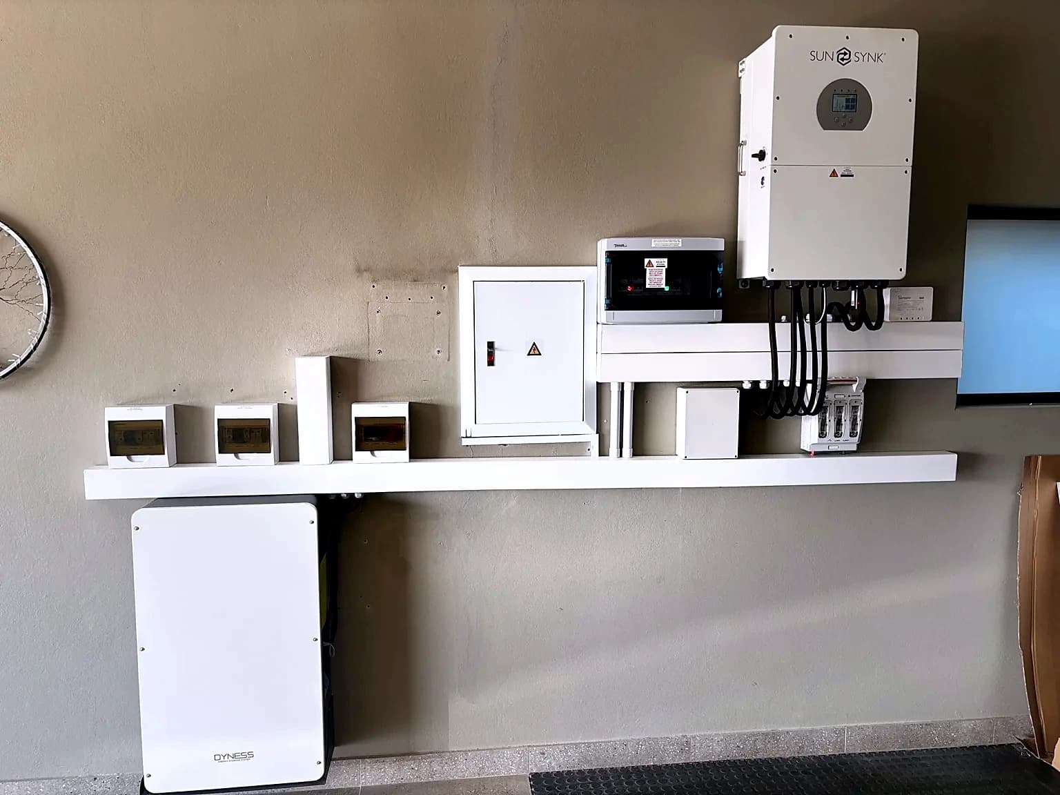Completed Sunsynk inverter and battery installation at a commercial site