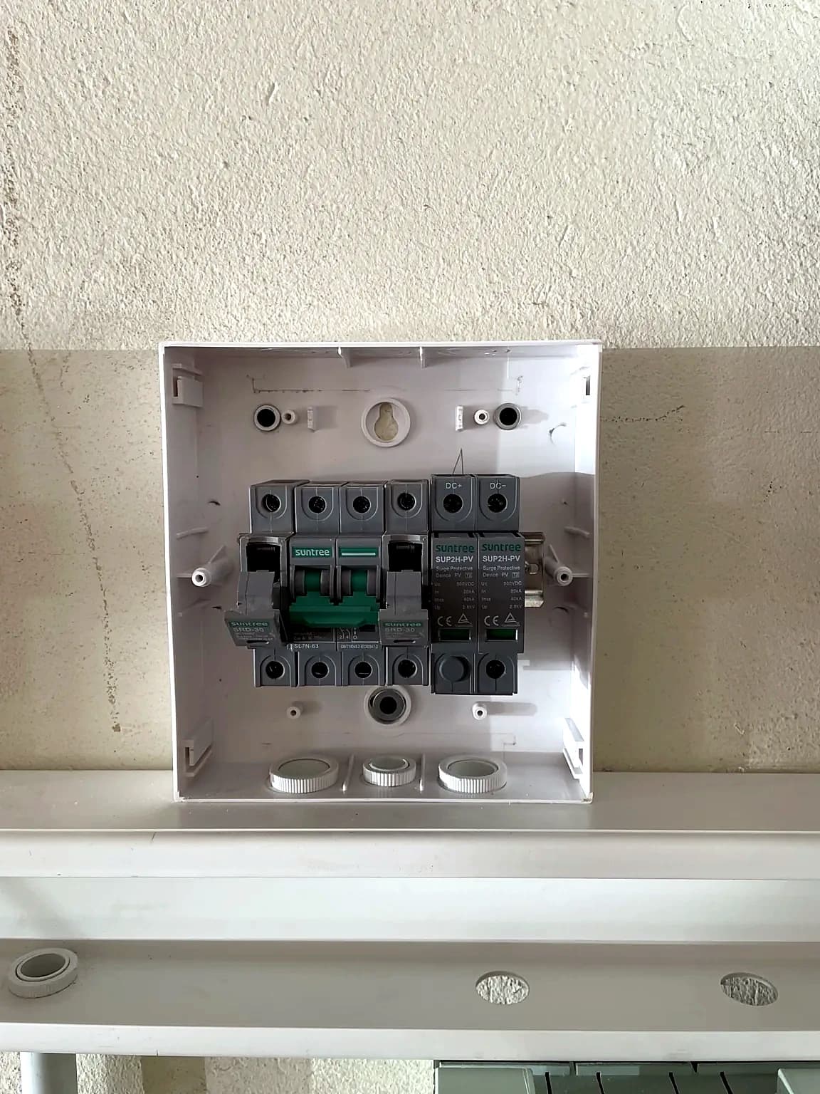 DC protection board with isolators and surge protection mounted for a solar installation