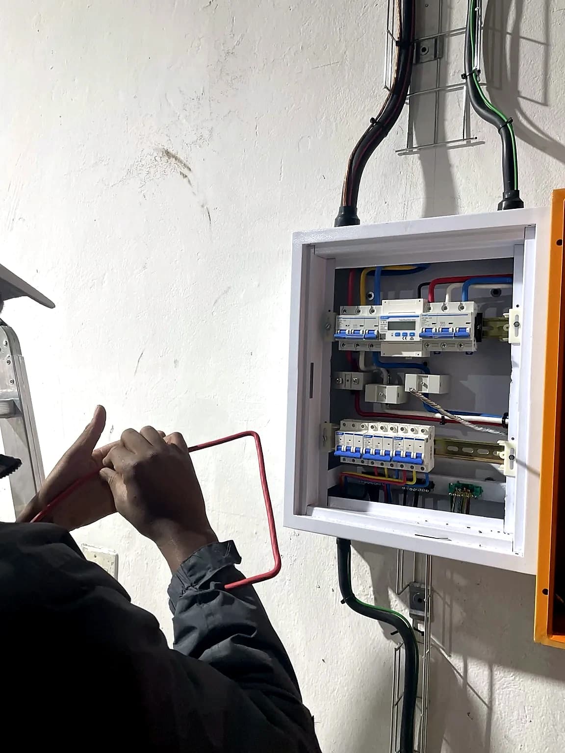ES Automation electrician wiring a distribution board on site