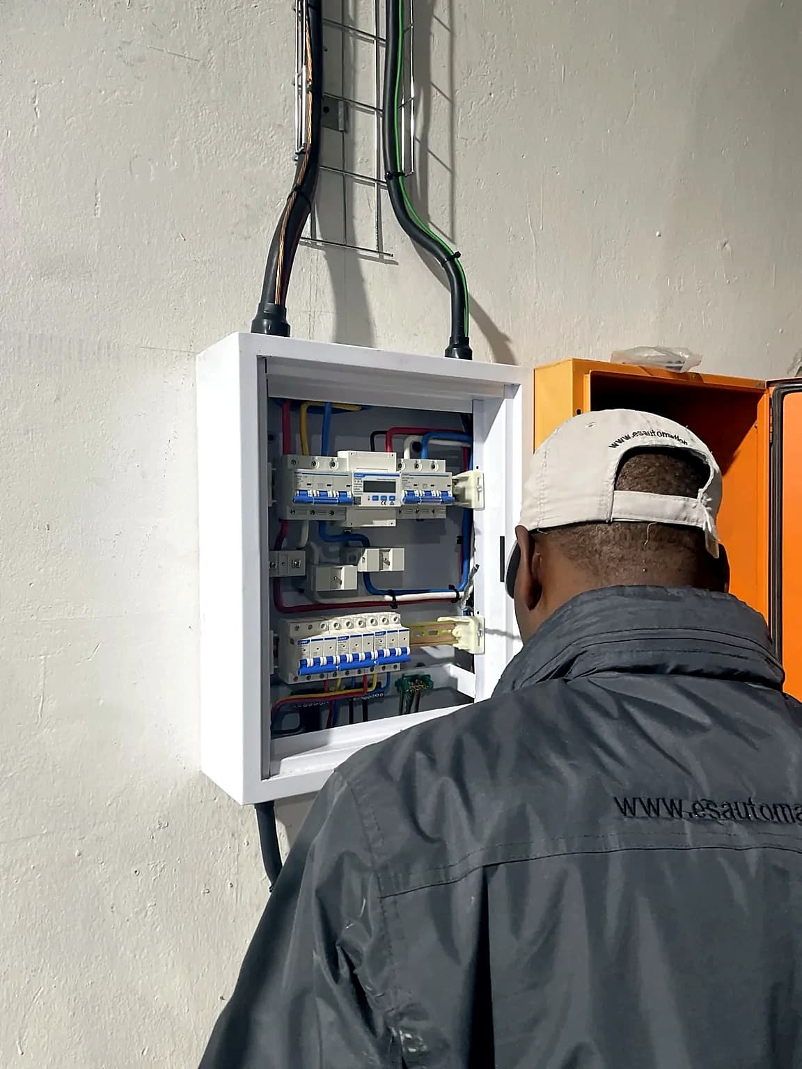 ES Automation electrician working on a distribution board installation